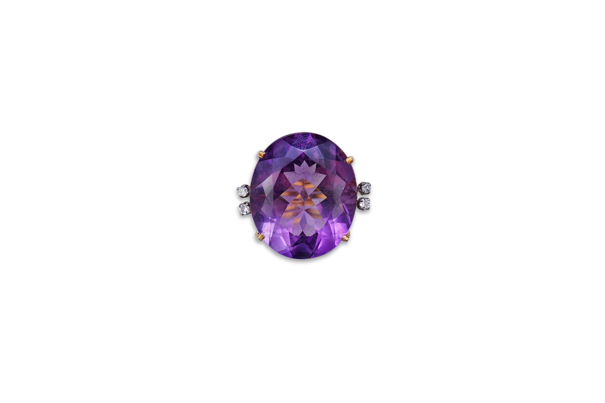 An amethyst and diamond ring